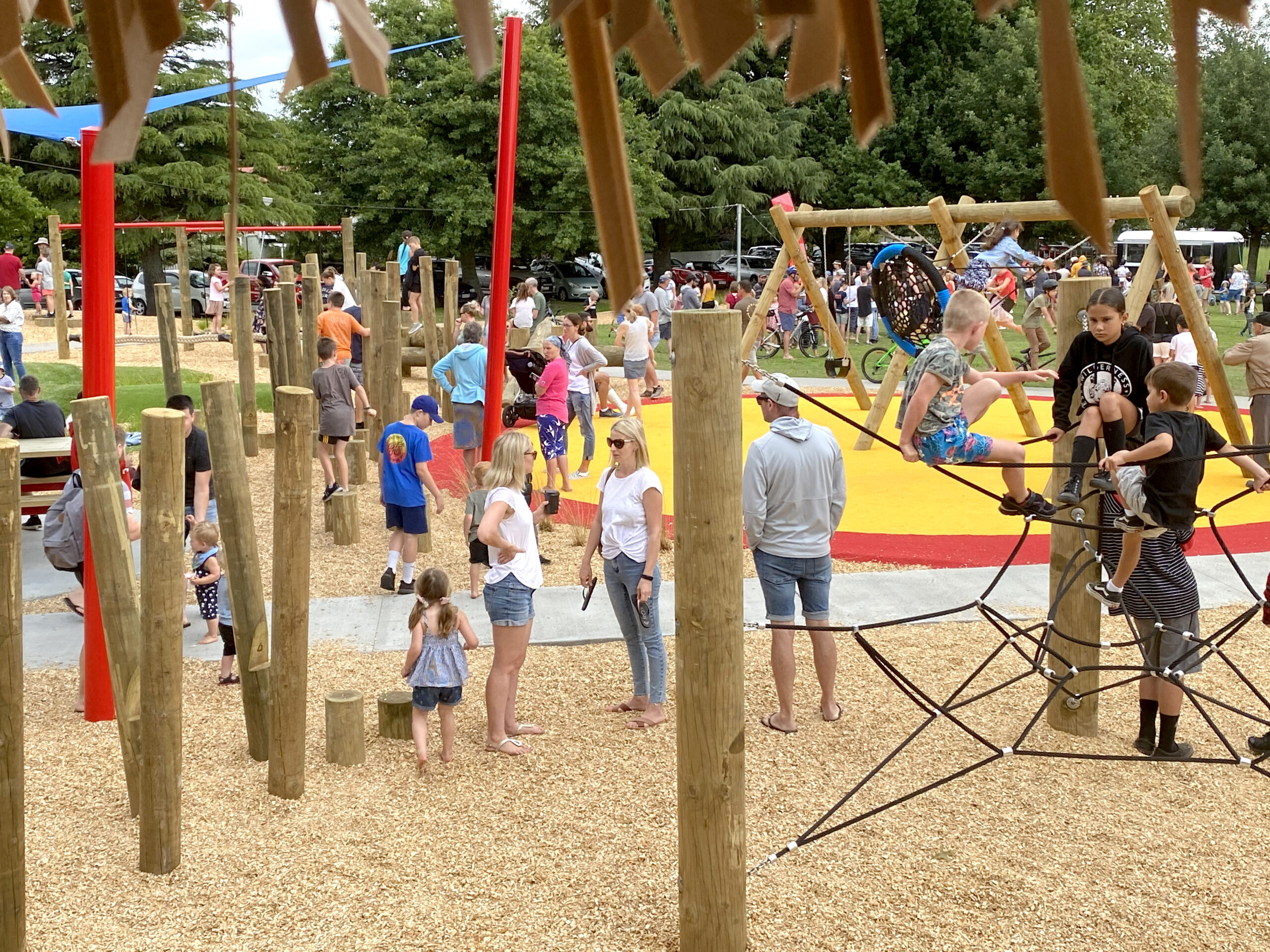 2. Thompson Street - Playground opening with people playground in action